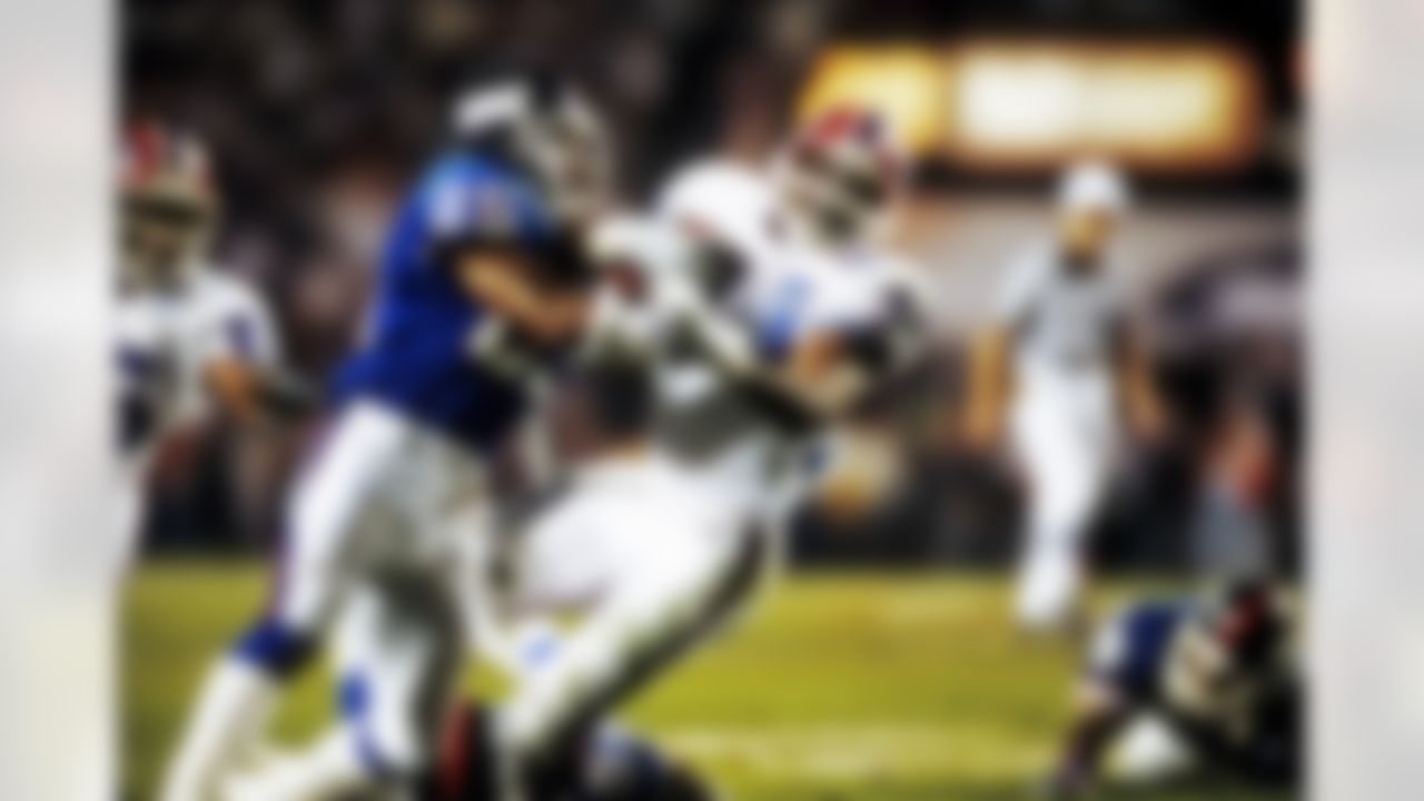 Buffalo Bills running back Thurman Thomas (34) carries the football for an 11-yard gain before being stopped by Giants cornerback Mark Collins (25) during the Bills 20-19 loss to the New York Giants in Super Bowl XXV at Tampa Stadium in Tampa, FL on January 27, 1991. (National Football League)