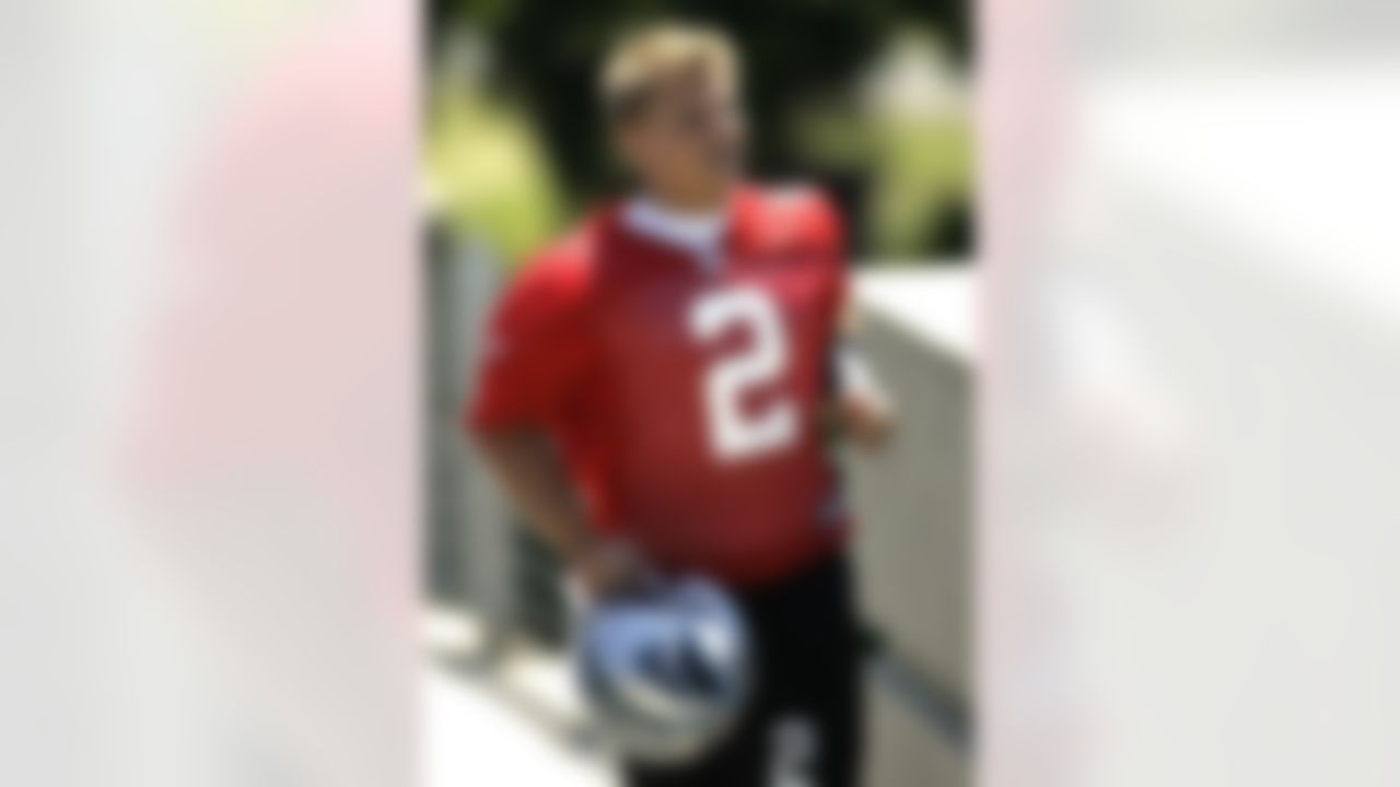 Carolina Panthers draft pick Jimmy Clausen (2) jogs onto the field during their NFL football minicamp on Friday, April 30, 2010, in Charlotte, N.C. (AP Photo/Rick Havner)