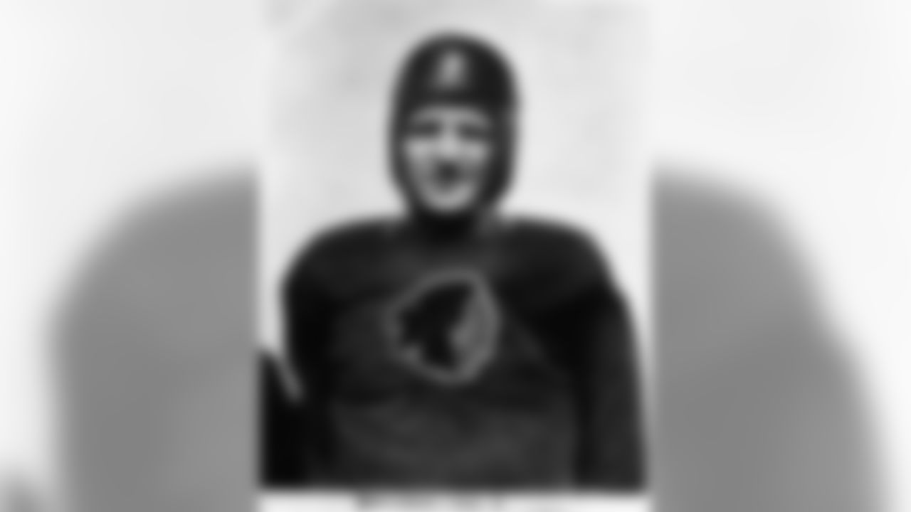 Washington Redskins quarterback Sammy Baugh (33) poses for a photo during training camp at Ballston Park in Virginia, Aug. 8, 1938. (National Football League)