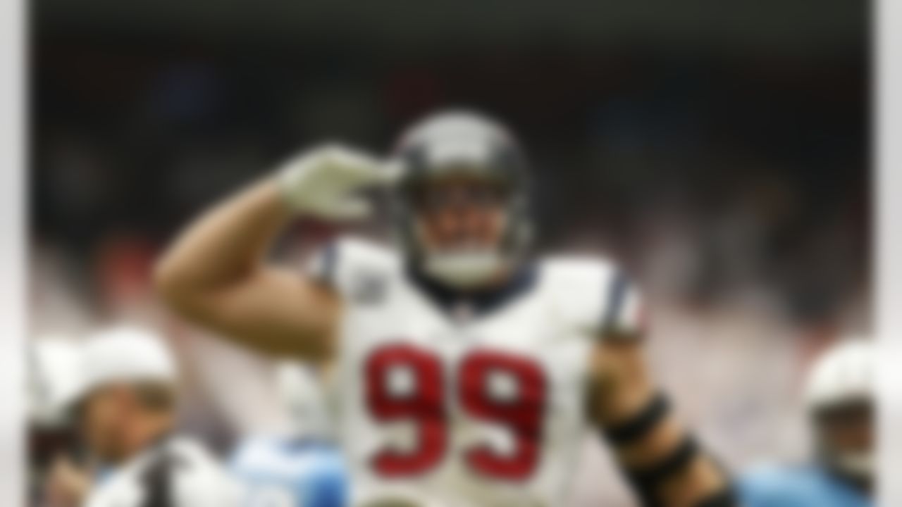 Houston Texans defensive end J.J. Watt (99) salutes the crowd after recording a sack during an NFL football game against the Tennessee Titans at Reliant Stadium on September 15, 2013 in Houston, Texas. Houston won 30-24. (Aaron M. Sprecher/NFL)