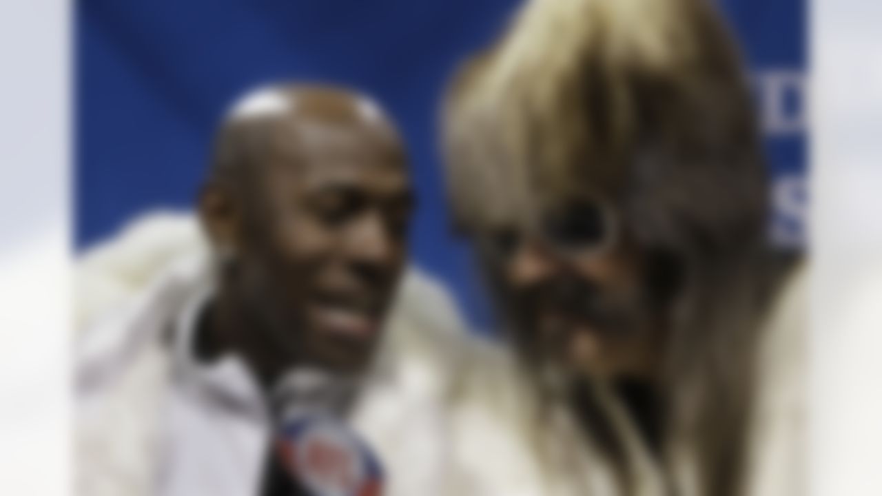 Green Bay Packers' Donald Driver, left, answers a question from reporter Victor Jacobs during media day for NFL football Super Bowl XLV Tuesday, Feb. 1, 2011, in Arlington, Texas. (AP Photo/Eric Gay)