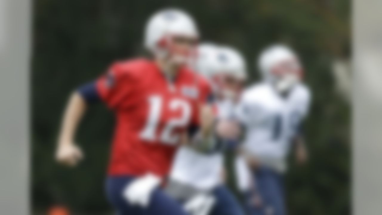 New England Patriots quarterback Tom Brady (12) runs a sprint during practice Friday, Jan. 30, 2015, in Tempe, Ariz. The Patriots play the Seattle Seahawks in NFL football Super Bowl XLIX Sunday, Feb. 1. (AP Photo/Mark Humphrey)