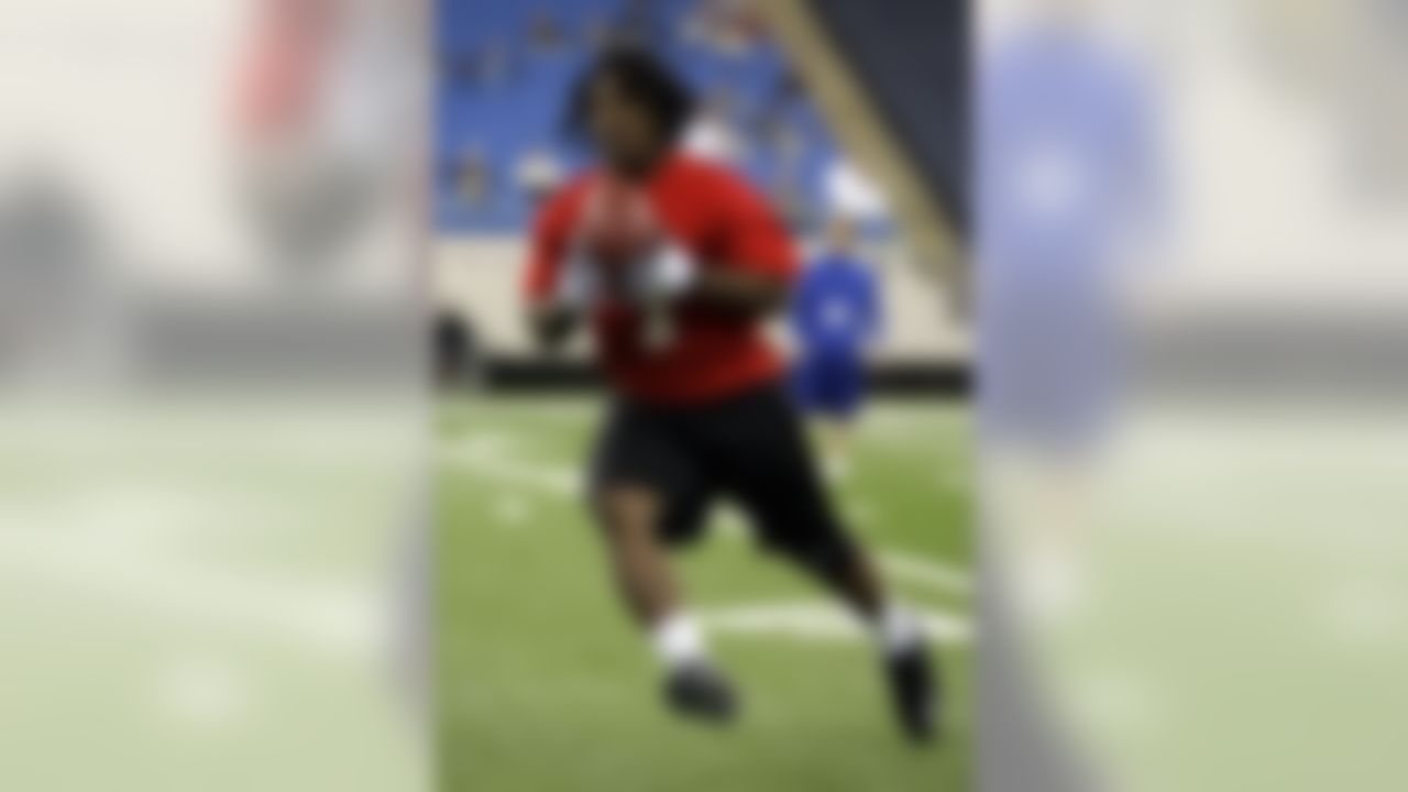 Running back Maurice Drew of UCLA heads up field after making a catch during a drill during the NFL combine in Indianapolis, Saturday, Feb. 25, 2006. (AP Photo/Michael Conroy)