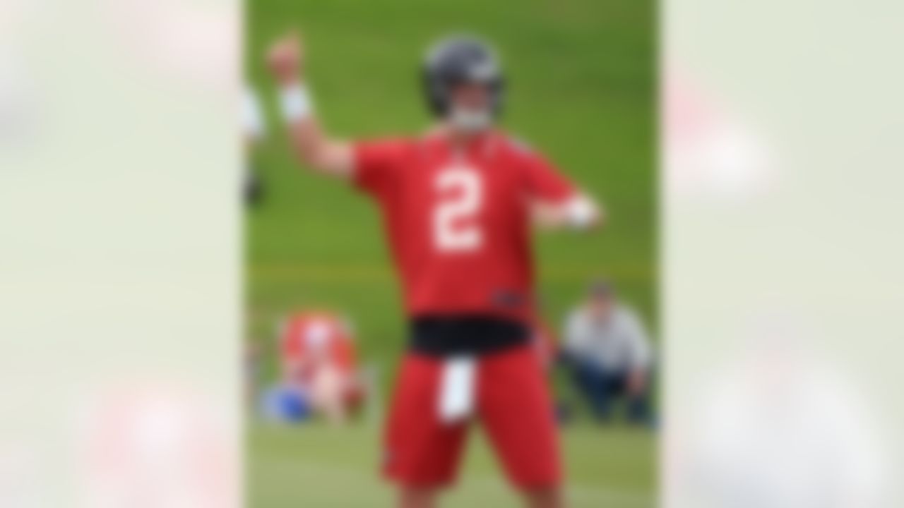 Atlanta Falcons quarterback Matt Ryan motions during NFL football minicamp Tuesday, June 18, 2013, in Flowery Branch, Ga. (AP Photo/David Tulis)