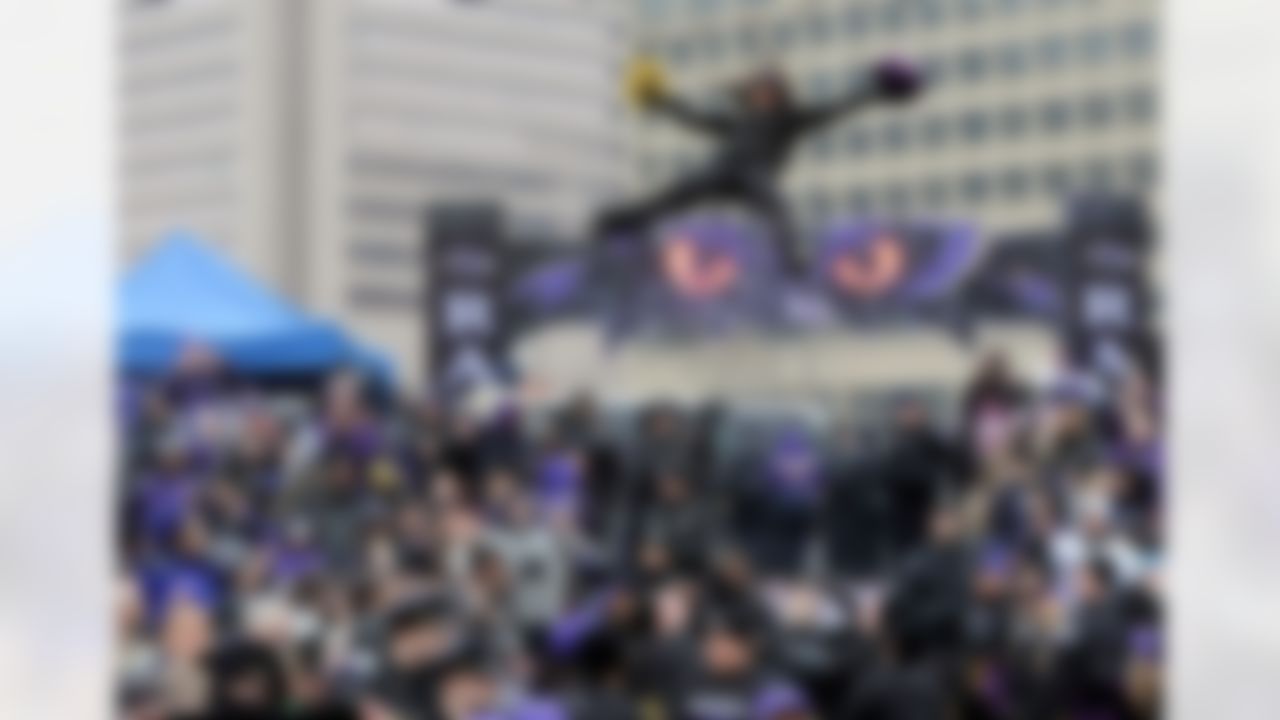 A Baltimore Ravens cheerleader performs a stunt during a send-off rally for the team on Monday, Jan. 28, 2013 in Baltimore. The NFL football team is leaving for New Orleans to face the San Francisco 49ers in the Super Bowl. (AP Photo/Steve Ruark)