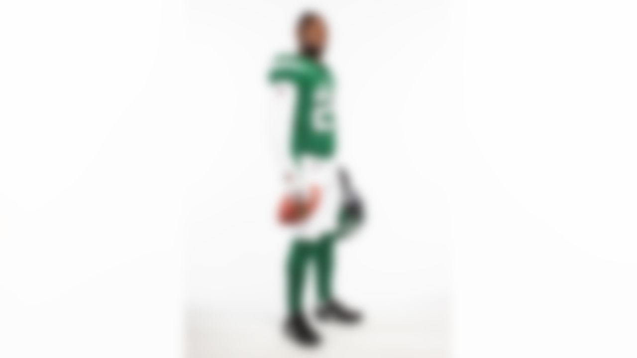 New York Jets running back Le'Veon Bell poses for a photo in his new New York Jets uniform at the Jets facility. After missing voluntary workouts, Bell joins the Jets' offseason program for mandatory minicamp on Monday, May 7, 2019, in Florham Park, N.J.