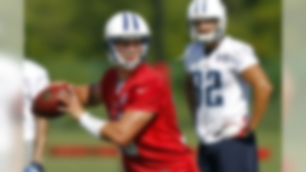 Tennessee Titans quarterback Jake Locker throws to a receiver during NFL football camp at Titans' headquarters Saturday, July 28, 2012 Nashville, Tenn. (AP Photo/Wade Payne)