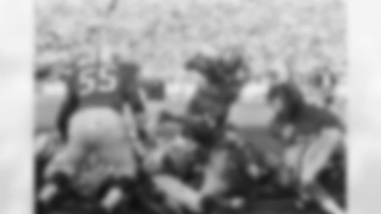 Florida State quarterback Jim Hammond dives over a pileup in the third period to score FSU's second touchdown in the Gator Bowl game on Dec. 30, 1967 in Jacksonville. Among the Penn State defenders are (55) Jim Kates and (40) Pete Johnson. (Associated Press)