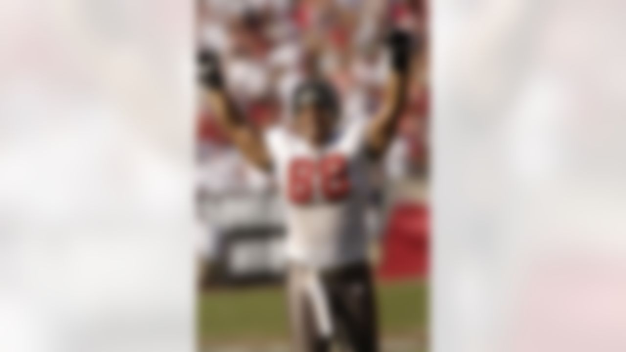 Tight end Anthony Becht #88 of the Tampa Bay Buccaneers raises his arms in triumph celebrating the Bucs last minute 14-13 victory against the Cincinnati Bengals at Raymond James Stadium on October 15, 2006 in Tampa, Florida. Photo by Getty Images.