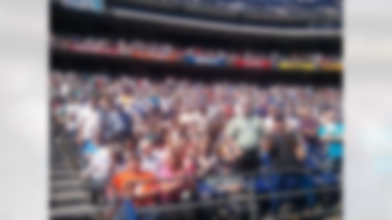 Fans look on during a father's day sermon by New York Jets quarterback Tim Tebow at Qualcomm Stadium in San Diego, California on June 17, 2012. (Kenny Legan/NFL)
