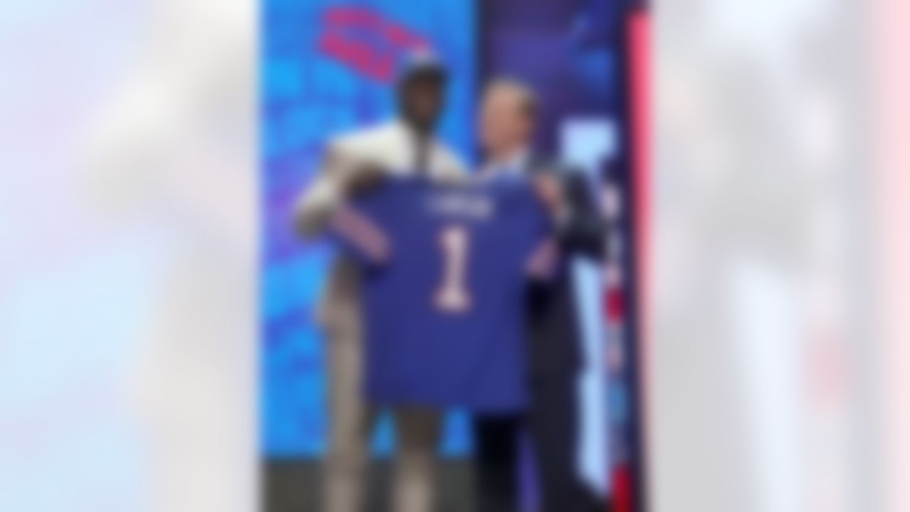 Clemson defensive end Shaq Lawson holds up his jersey with NFL Commissioner Roger Goodell after being drafted by the Buffalo Bills during the 2016 NFL Draft at the Auditorium Theatre on Thursday, April 28, 2016 in Chicago. (Perry Knotts/NFL)