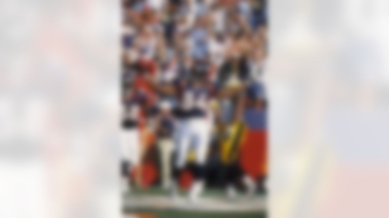 Denver Broncos tight end Shannon Sharpe (84) celebrates during an NFL game against the Pittsburgh Steelers, Sunday, Oct. 12, 2003 in Denver. The Broncos won the game, 17-14. (AP Photo/Greg Trott)