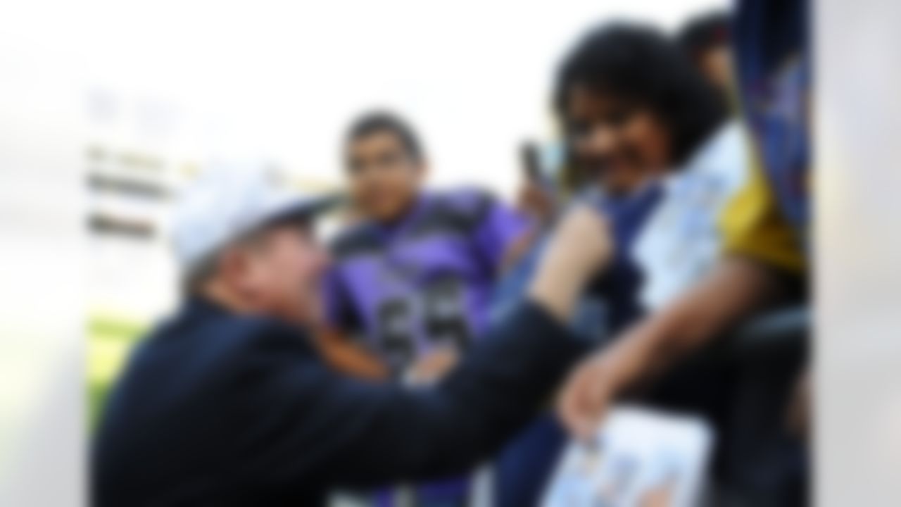 May 11, 2012; San Diego, CA, USA; Former San Diego Chargers head coach Bobby Ross signs autographs prior to a celebration of life service to remember Junior Seau at Qualcomm Stadium. Mandatory Credit: Christopher Hanewinckel-US PRESSWIRE