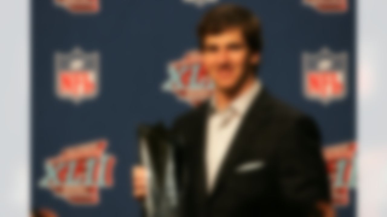 PHOENIX - FEBRUARY 04: New York Giants Super Bowl MVP quarterback Eli Manning addresses the media and holds the MVP trophy during a press conference at the Phoenix Convention Center on February 4, 2007 in Phoenix, Arizona. (Photo by Gene Lower/Getty Images)