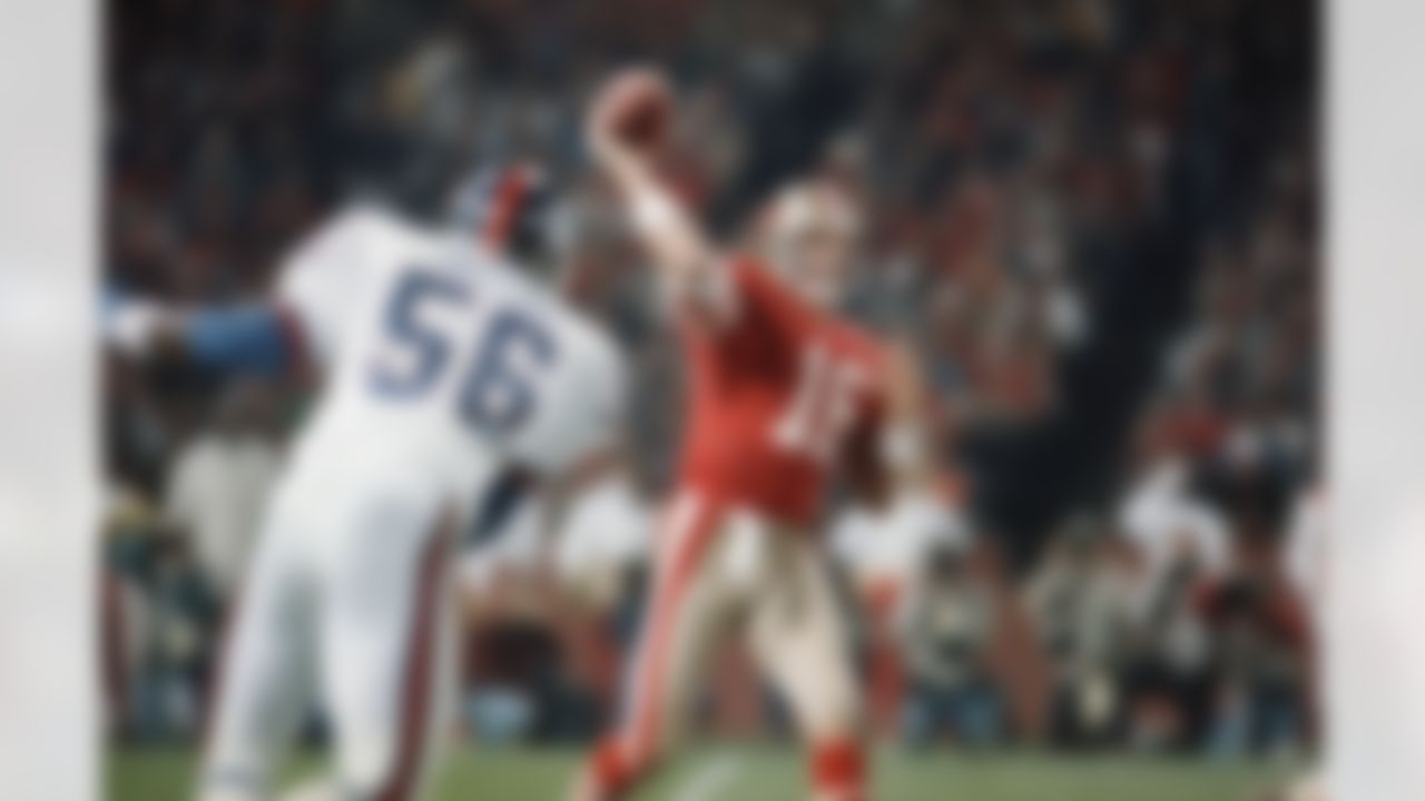 San Francisco 49ers quarterback Joe Montana (16), fired off the ball before New York Giants linebacker Lawrence Taylor (56), can reach him during the first quarter of their NFL game in Candlestick Park, San Francisco, Monday, Dec. 1, 1986. (AP Photo/Paul Sakuma)