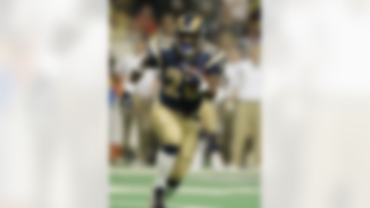 In 13 seasons with the Colts and Rams, Marshall Faulk rushed for 12,279 yards. Photo by Jeff Gross/Getty Images.