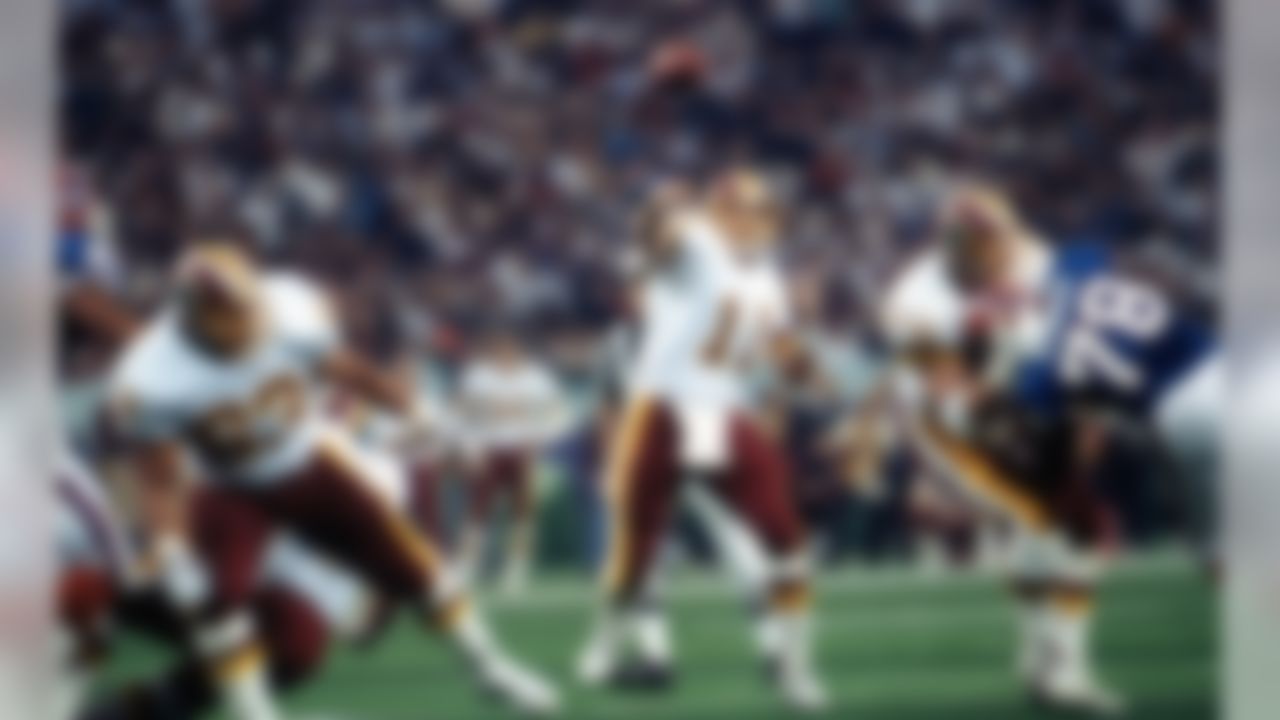 Washington Redskins quarterback Mark Rypien throws a pass during a Super Bowl XXVI game against the Buffalo Bills in Minneapolis, on January 26, 1992. (AP Photo/Al Messerschmidt)