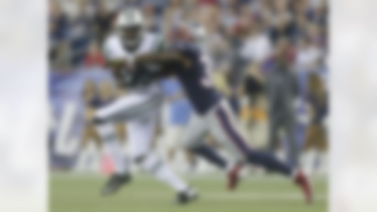 New York Jets wide receiver Stephen Hill (84) catches a pass in front of New England Patriots cornerback Aqib Talib, right, in the first quarter an NFL football game Thursday, Sept. 12, 2013, in Foxborough, Mass. Hill fumbled the ball away later in the play. (AP Photo/Charles Krupa)