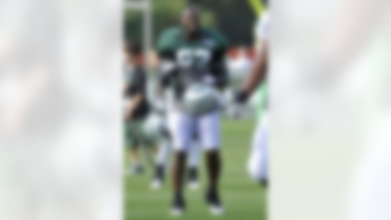 New York Jets linebacker Bart Scott reacts at NFL football training camp on Sunday, July 29, 2012, in Cortland, N.Y. (AP Photo/Bill Kostroun)