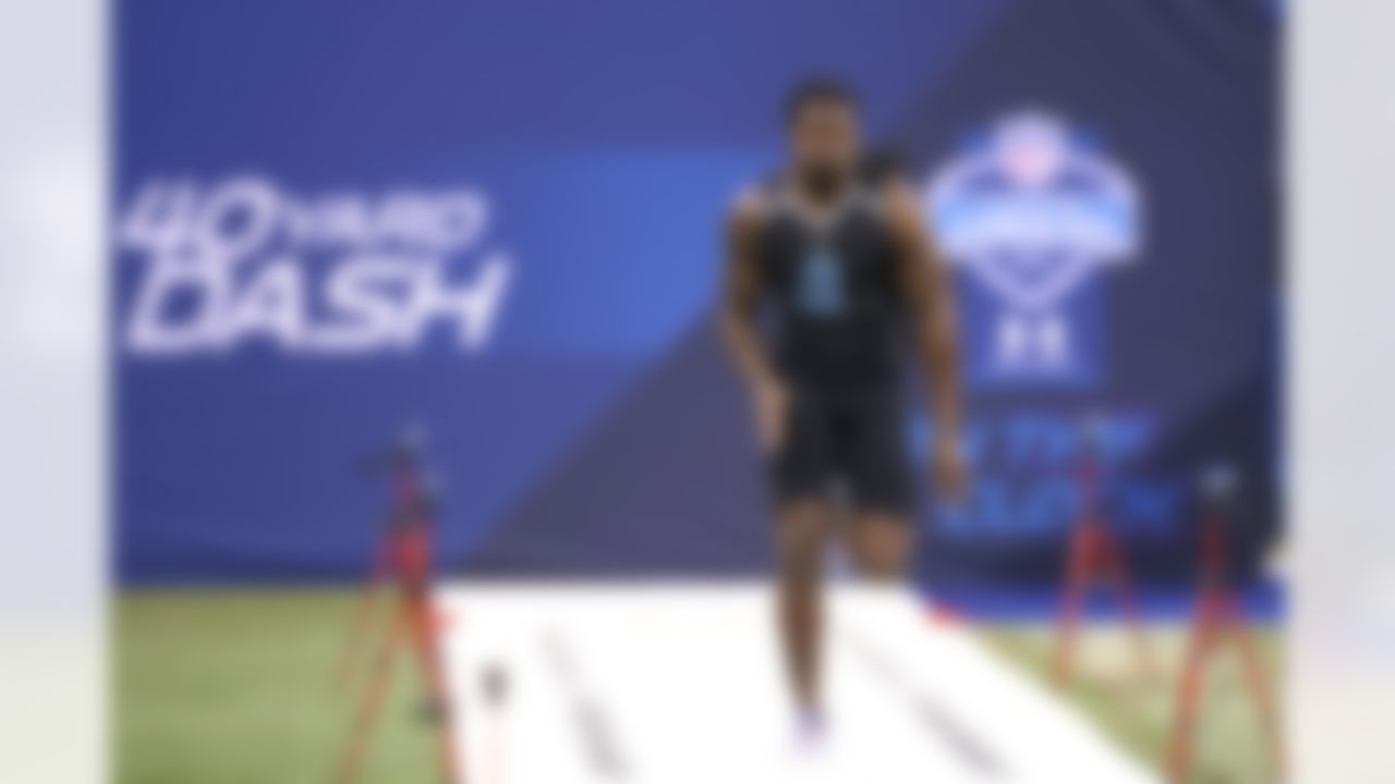 Defensive end Jadeveon Clowney runs the 40-yard dash at the 2014 NFL Scouting Combine at Lucas Oil Stadium. (Ben Liebenberg/NFL)