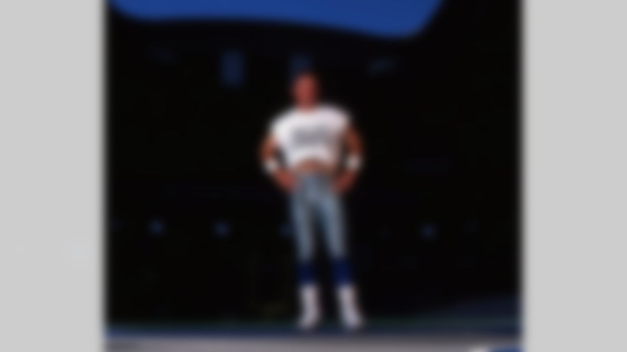 American Hall of Fame quarterback Troy Aikman #8 of the Dallas Cowboys. The overall draft pick in 1989, Aikman played 12 consecutive seasons as quarterback with the Cowboys. (AP Photo/Marc Serota)