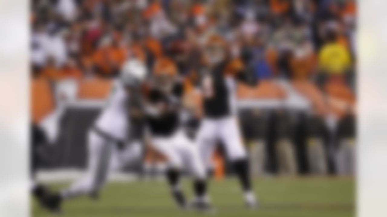 Cincinnati Bengals quarterback Carson Palmer (9) passes the football against the New York Jets during the AFC Wild Card Playoff game at Paul Brown Stadium in Cincinnati, Ohio on January 9, 2010. The Jets won 24-14. (Joe Robbins / NFL.com)