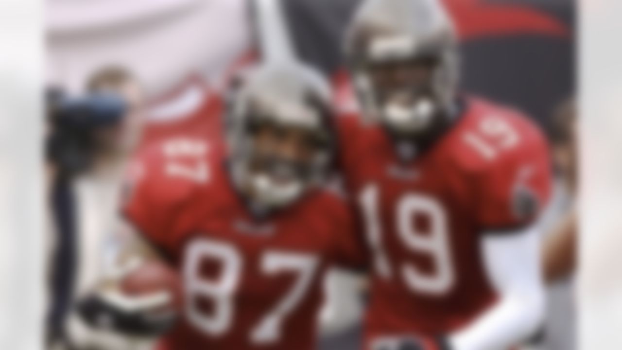 Tampa Bay Buccaneers wide receivers Keenan McCardell (87) and Keyshawn Johnson (19) celebrate a touchdown pass against the Atlanta Falcons at Raymond James Stadium, Tampa, Fla. Dec. 8, 2002.