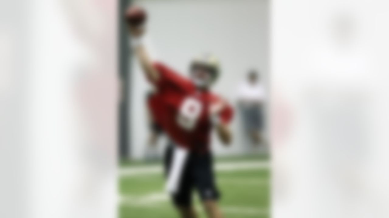 New Orleans Saints quarterback Drew Brees (9) works out during the first practice of NFL football training camp at their indoor training facility in Metairie, La., Thursday, July 26, 2012. (AP Photo/Gerald Herbert)