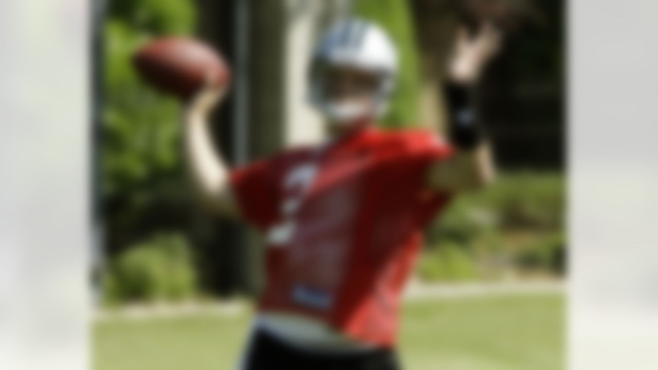 Carolina Panthers' first pick in the 2010 draft, Jimmy Clausen, from Notre Dame, throws a pass during an NFL football minicamp on Friday, April 30, 2010 in Charlotte, N.C. (AP Photo/Rick Havner)