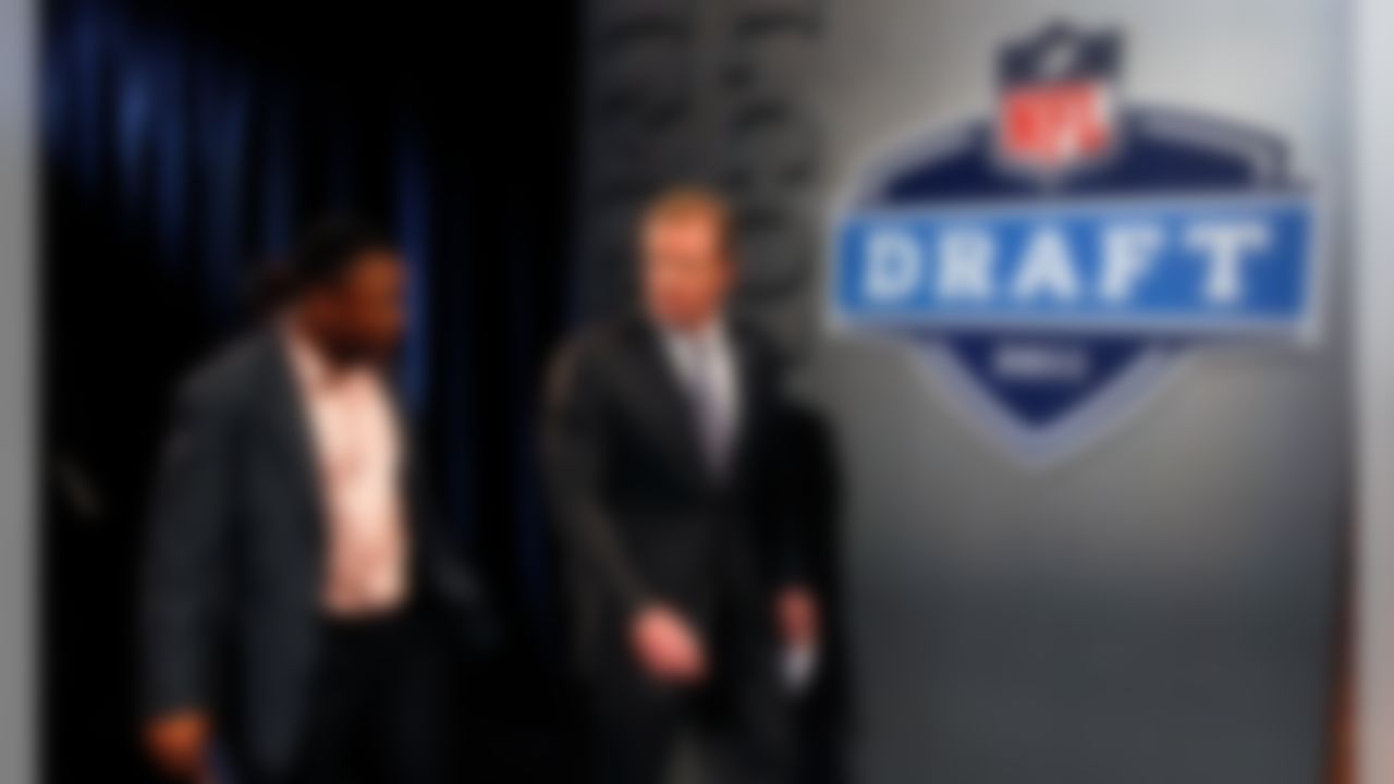 Lions former player Barry Sanders with Commissioner Roger Goodell during the 2011 NFL Draft at Radio City Music Hall on April 29, 2011 in New York, NY. (AP Photo/Ben Liebenberg)