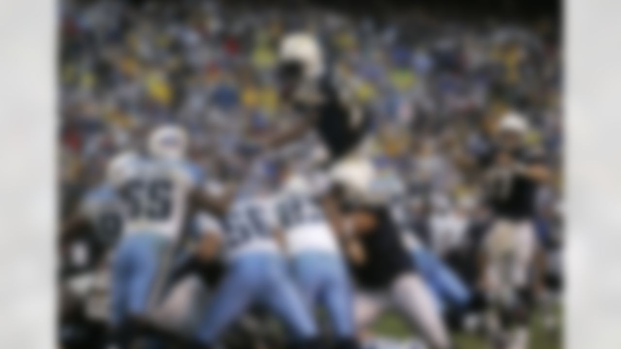 San Diego Chargers LaDainian Tomlinson goes over the top for a one-yard touchdown in the fourth quarter of the Chargers' 17-6 victory over the Tennessee Titans in their wild-card playoff football game Sunday, Jan. 6, 2008, in San Diego. (AP Photo/Lenny Ignelzi)
