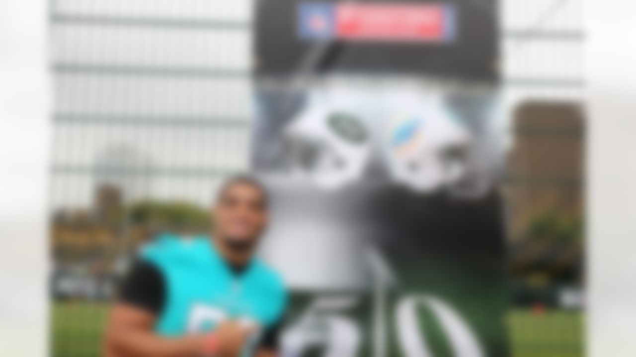 Miami Dolphins defensive end Olivier Vernon (50) poses for a photo during an NFL Summer Bowl tournament at the Black Prince Community Hub in London on Wed., July 15, 2015. (Dave Shopland/NFL)