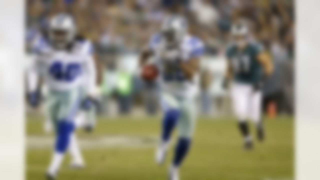 Dallas Cowboys cornerback Brandon Carr (39) returns an interception 47 yards for a touchdown during an NFL football game against the Philadelphia Eagles on Sunday, November 11, 2012, at Lincoln Financial Field in Philadelphia, Pennsylvania. The Cowboys defeated the Eagles, 38-23. (AP Photo/James D Smith)