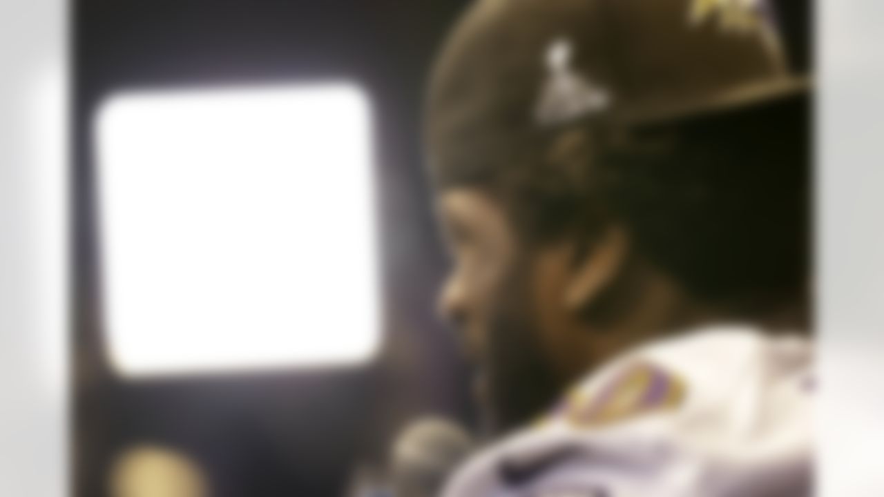 Baltimore Ravens safety Ed Reed (20) is caught in the glare of the television lights during media day for the NFL Super Bowl XLVII football game Tuesday, Jan. 29, 2013, in New Orleans. (AP Photo/Pat Semansky)