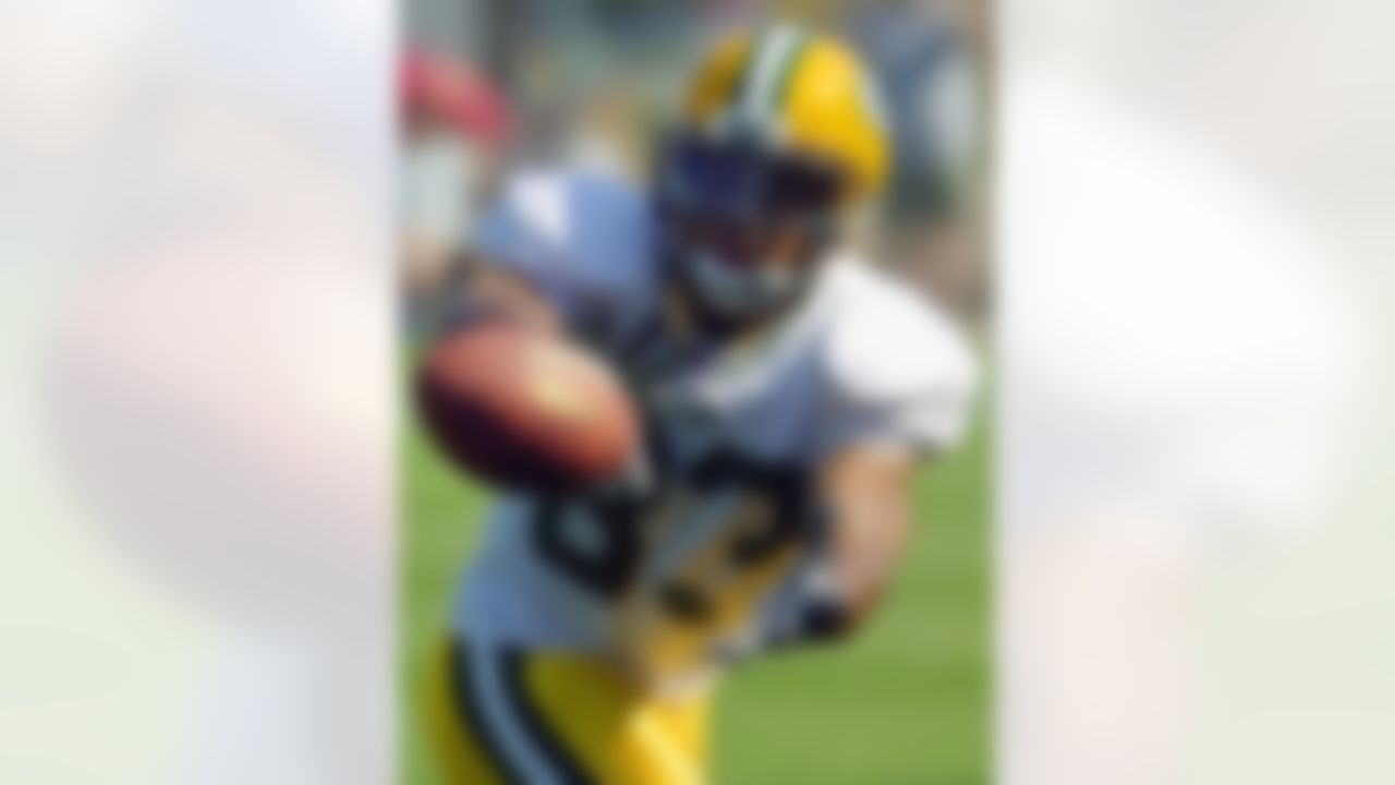 Green Bay Packers' Terry Glenn catches a pass at training camp Sunday, July 28, 2002, in Green Bay, Wis. (Morry Gash/Associated Press)