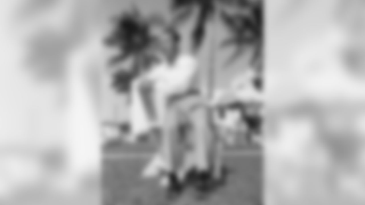 Shown in photo is Don Hutson all American Football Player, relaxes on April 3, 1951 in sun at General Lee Apartment in Hollywood Beach, Florida, USA. (AP Photo/Earl Shugars)
