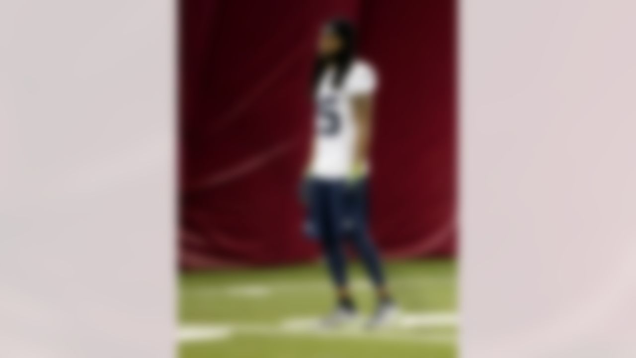 Seattle Seahawks' Richard Sherman stretches during a team practice for NFL Super Bowl XLIX football game, Friday, Jan. 30, 2015, in Tempe, Ariz. The Seahawks play the New England Patriots in Super Bowl XLIX on Sunday, Feb. 1, 2015. (AP Photo/Matt York)