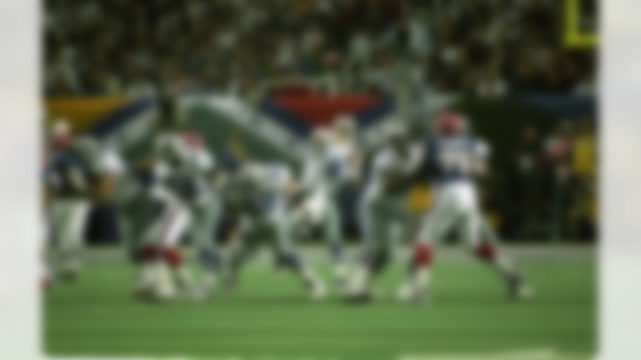 Dallas Cowboys Hall of Fame quarterback Troy Aikman (8) fires a pass during Super Bowl XXVIII, a 30-13 victory over the Buffalo Bills on January 30, 1994, at the Georgia Dome in Atlanta, Georgia. (National Football League)