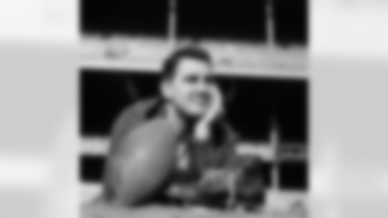 Pat Summerall, whose place kicking has given the New York Giants a crack at the NFL title, poses with his shoe and pigskin at team's workout, Dec. 27, 1958 in Yankee Stadium, New York. Pat will be out to continue his winning boots in championship game against the Baltimore Colts. Two weeks ago he kicked a field goal against the Cleveland Browns to give the Giants a tie for the league's eastern division title. Last week he kicked a field goal and point after touchdown in the team's 10-0 win over the Browns. (AP Photo/Harry Harris)
