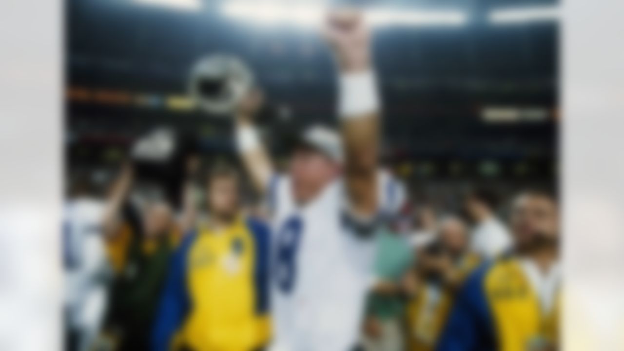 Dallas Cowboys quarterback Troy Aikman celebrates the Cowboys' 30-13 Super Bowl win over the Buffalo Bills, Sunday, Jan. 30, 1994 at Atlanta's Georgia Dome. (AP Photo/Doug Mills)