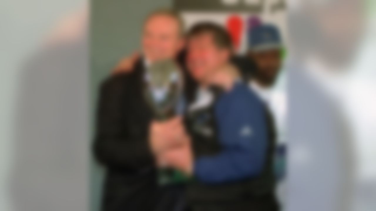 Dallas Cowboys owner Jerry Jones, left, and coach Jimmy Johnson celebrating with the Super Bowl XXVIII trophy after defeating the Buffalo Bills 30-13 at Atlanta's Georgia Dome. (AP Photo/Charles Krupa)