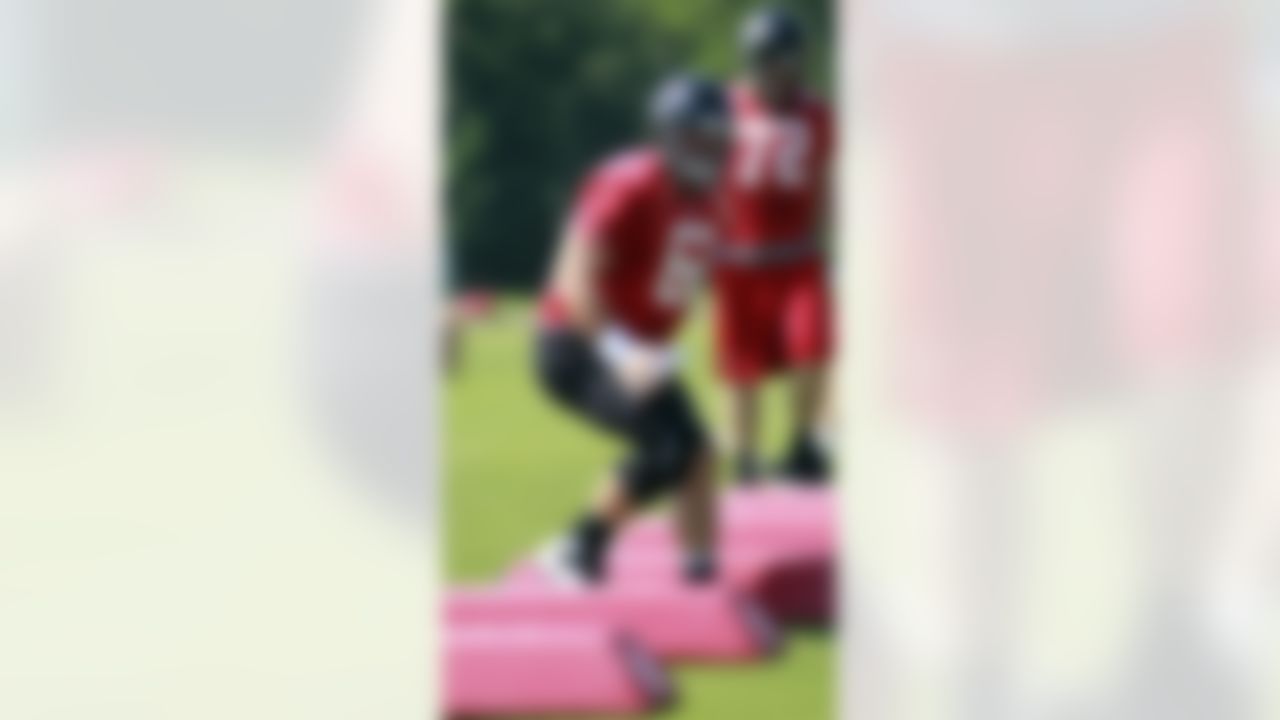 Atlanta Falcons center Joe Hawley runs through a drill during NFL football training camp in Flowery Branch, Ga., Thursday, July 26, 2012. (AP Photo/John Bazemore)
