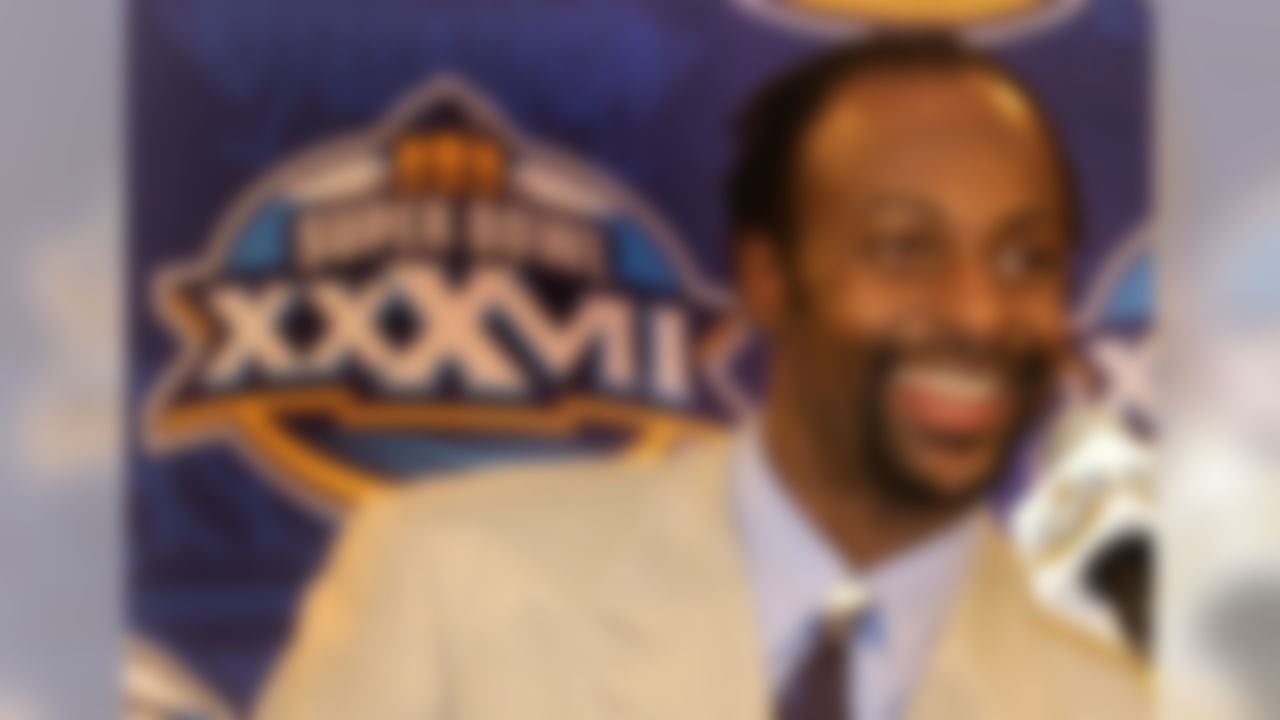 Wide receiver Jerry Rice of the AFC champion Oakland Raiders talks with the media after arriving with his teammates at the team hotel in La Jolla, Ca. on Monday, January 20, 2003. The Raiders will face the Tampa Bay Buccaneers in Super Bowl XXXVII on Sunday. (AP Photo/Amy Sancetta)