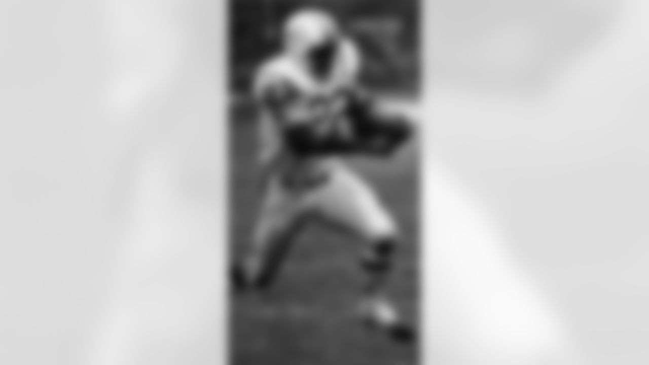 Miami Dolphins running back Mercury Morris is pictured in action in 1972. (Associated Press)