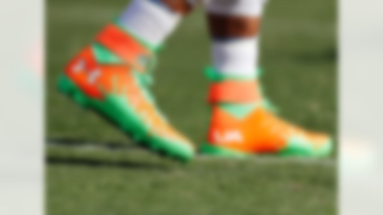 Newton wore these Nickelodeon looking cleats during warmups for his game against the Los Angeles Rams. I don�t understand why he can�t seem to get better/cooler cleats from Under Armour.