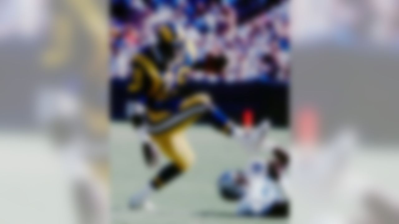 Los Angeles Rams Hall of Fame running back Eric Dickerson (29) runs upfield during game against the Chicago Bears, Oct. 2, 1983 at Anaheim. The Rams defeated the Bears 21-14. (National Football League)