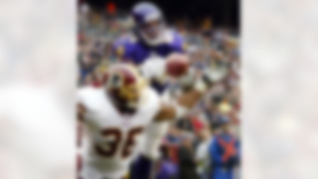 Minnesota Vikings wide reciever Randy Moss catches a touchdown pass over Washington Redskins safety Sean Taylor on Sunday, Jan. 2, 2005, in Landover, Md. The Redskins won the game 21-18. (AP Photo/Evan Vucci)