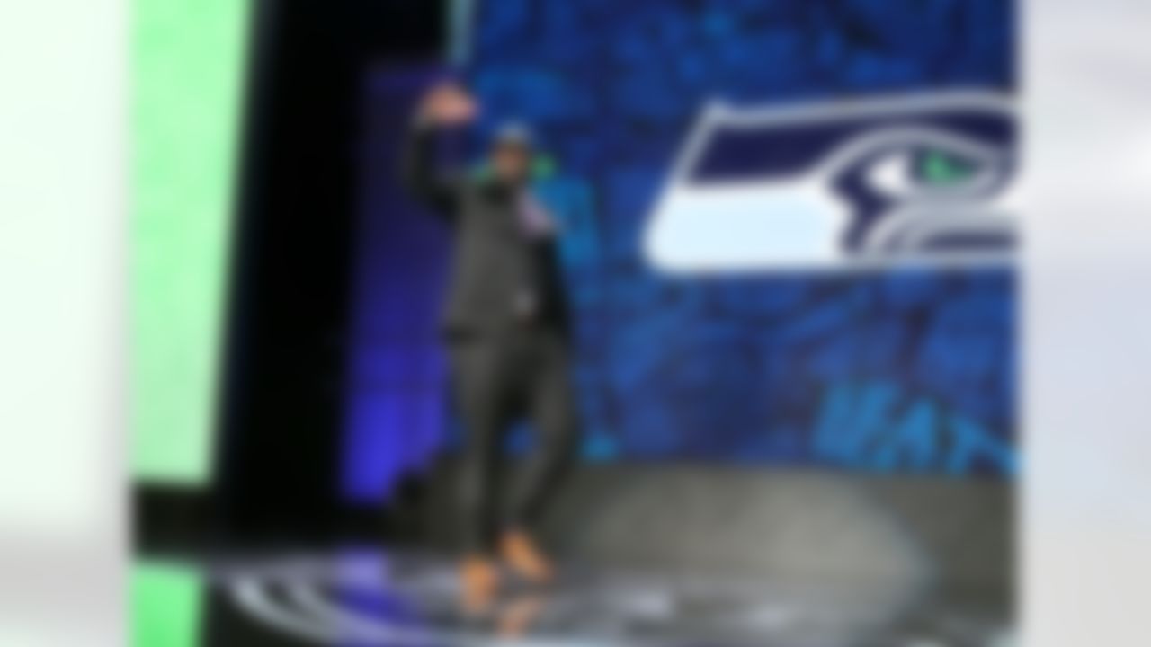 Alabama defensive tackle Jarran Reed celebrates on stage after being selected by the Seattle Seahawks during the 2016 NFL Draft at the Auditorium Theatre on Friday, April 29, 2016 in Chicago. (Perry Knotts/NFL)