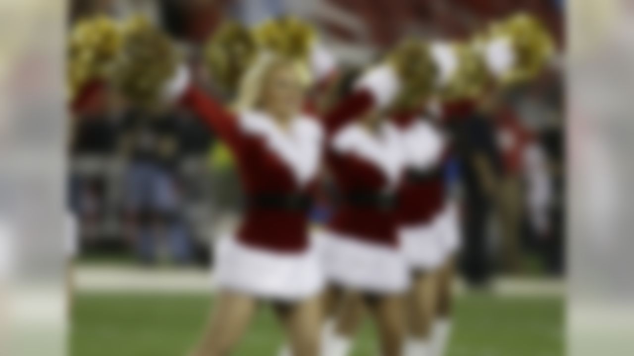 San Francisco 49ers cheerleaders perform during the first half of an NFL football game between the San Francisco 49ers and the San Diego Chargers in Santa Clara, Calif., Saturday, Dec. 20, 2014. (AP Photo/Ben Margot)