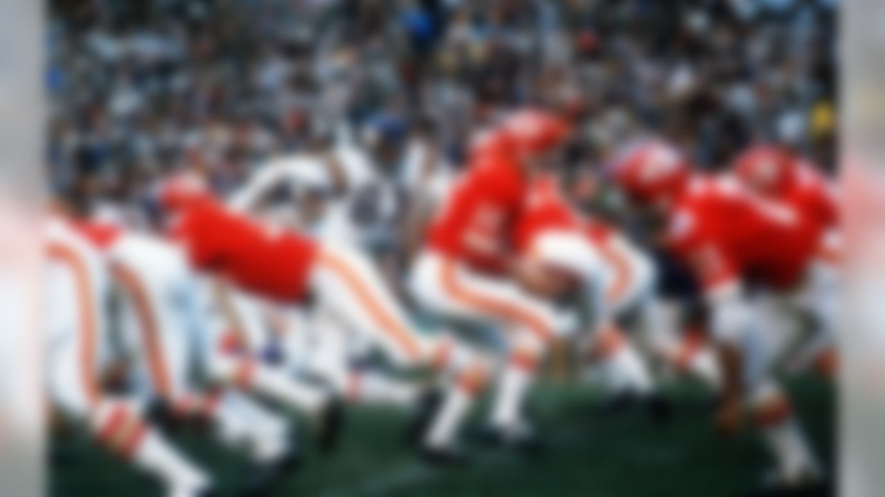 Kansas City Chiefs quarterback Len Dawson (16) turns around to hand the ball off to running back Mike Garrett (21) in Super Bowl IV in New Orleans, Louisiana, Jan. 11, 1970, against the Minnesota Vikings. (Associated Press)
